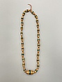 Necklace of 26 oval cylinders, Beeswax and straw, Songhay
